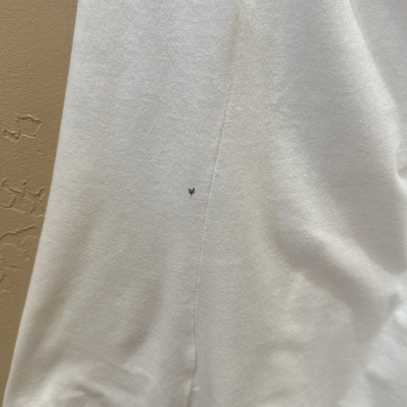 White tank “. Personally victimized by my Trainer”. - Picture 6 of 8